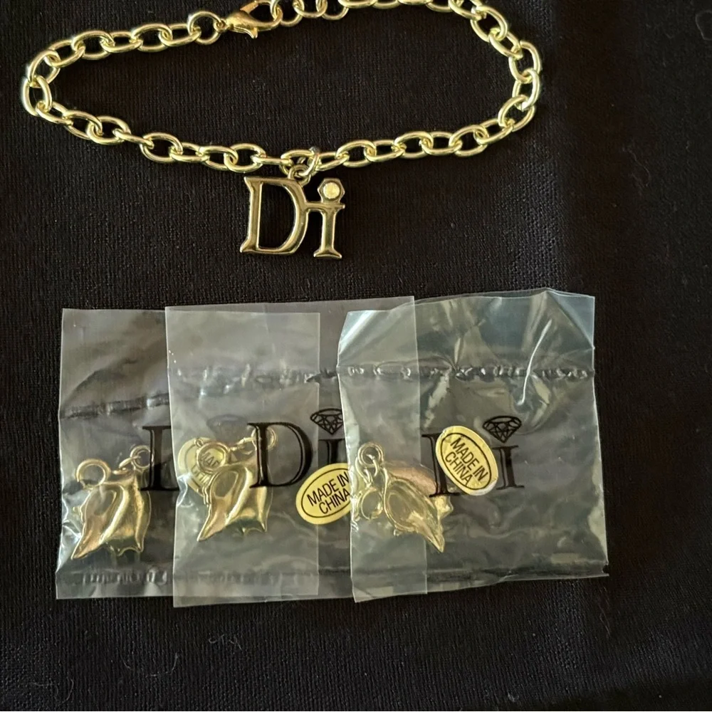 Diamond International Gold Charm Bracelet Set. 8 bracelets multiple charms. - Picture 11 of 15